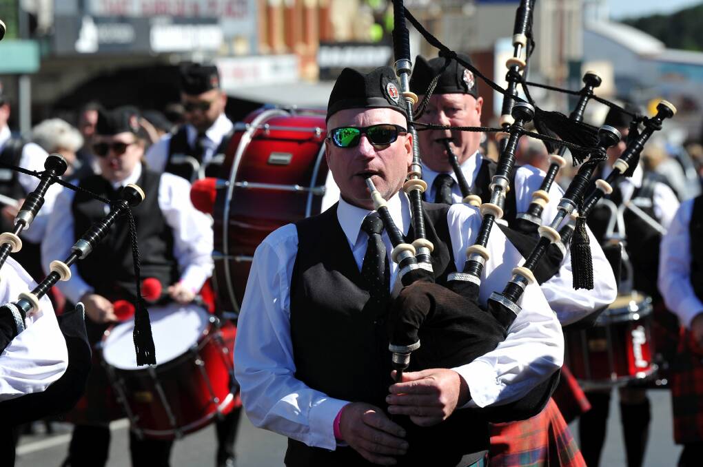 ON SHOW: Pipe bands parade along Vincent Street on Saturday morning. Picture: Lachlan Bence 