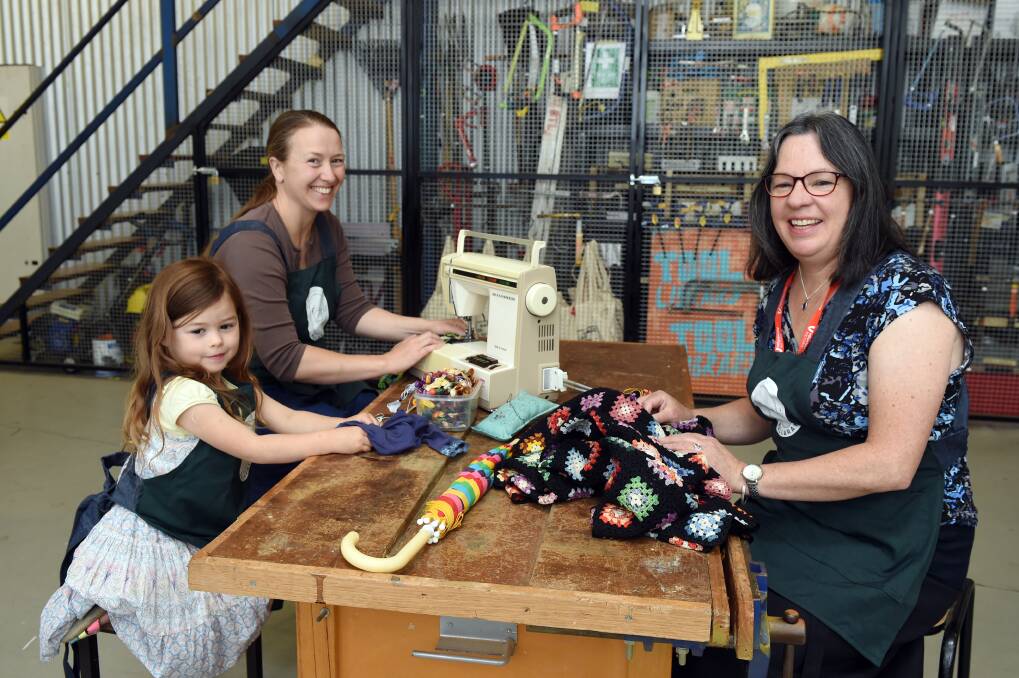 RETURN: Repair Cafe Ballarat volunteers Ada Bry Wade, 4, Liz Wade and Sue Jakob are looking forward to welcoming repairers into the new space. Picture: Kate Healy 