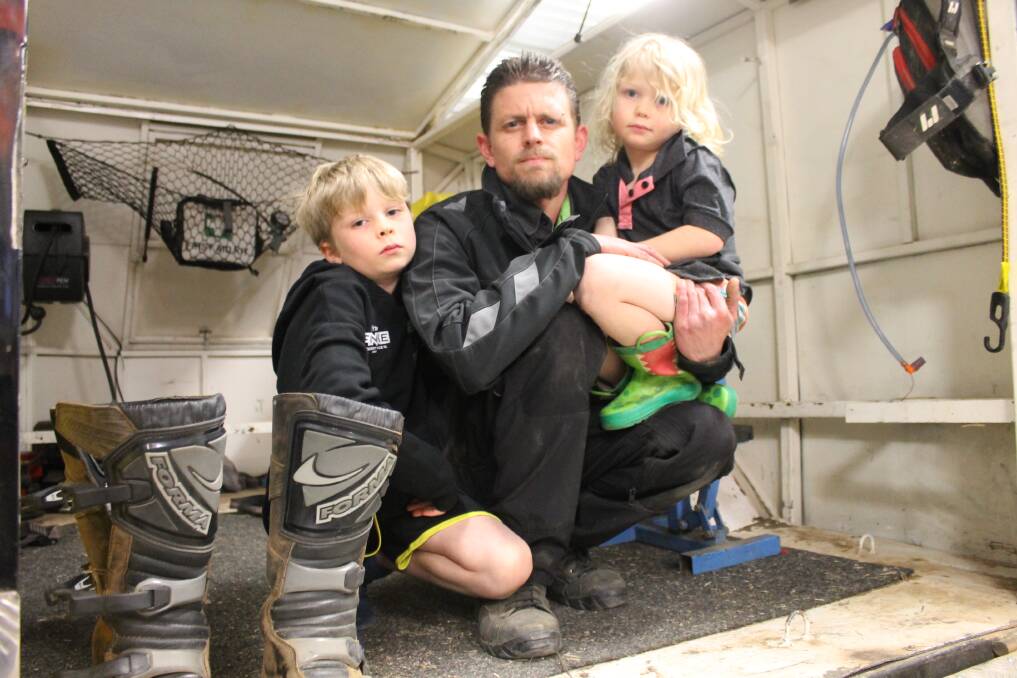 DEVASTATED: Ned, Edan and Frankie Cassell's motorbike trailer now lies empty, after a burglary at their Invermay property. Picture: Rochelle Kirkham 
