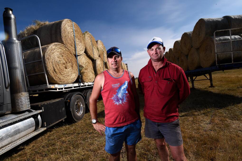 Charlie Groves and Shaun Mahar have contributed to an effort to collect hay from farmers in the area to take to Gippsland as part of the fire relief effort.