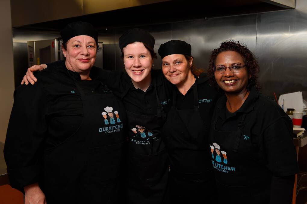 COMMUNITY: Ballarat Neighbourhood Centre chef and trainer Kate Mirvis with volunteers Zoe Sharpe, Jessie Smith and Noreen Van Den Hoek. Picture: Adam Trafford 