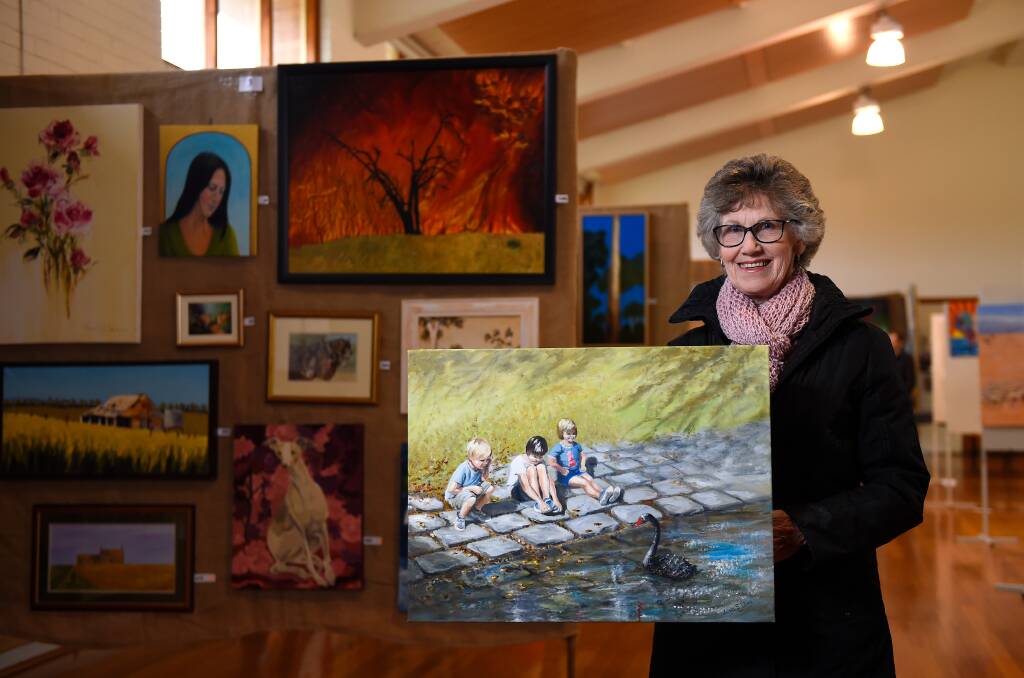EXHIBIT: Artist Joan Day with her work 'Fascination' that will be on show at the Pyrenees Art Exhibition and Sale throughout the Queen's birthday long-weekend. Picture: Adam Trafford 