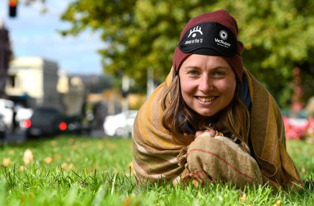 RUGGED UP: Kate Gertners is sleeping at the MCG on Thursday night to raise funds and awareness for youth homelessness. Picture: Adam Trafford 