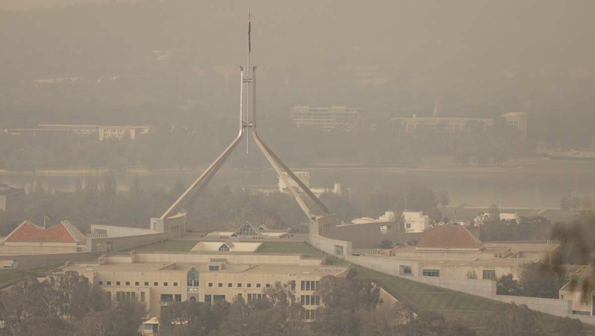  Bushfire smoke at Parliament House. Picture: Sitthixay Ditthavong
