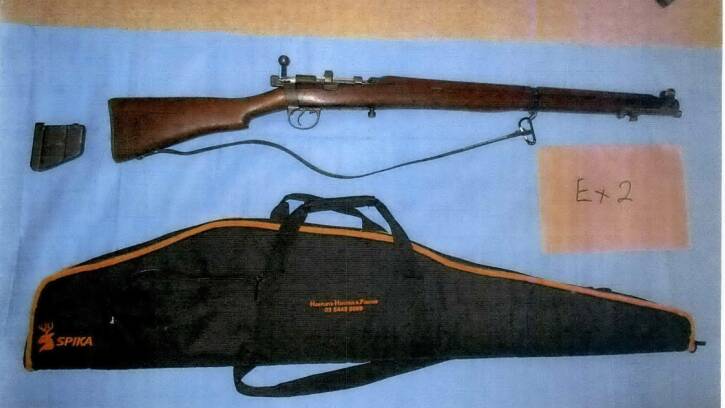 Police photos of firearms found at Gartside's home. 