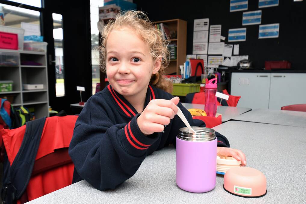 NO PLASTIC: Grade two student Abigail shows off her wrapper free lunch. Picture: Kate Healy 