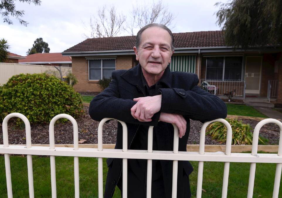 NEW HOME: 65-year-old Cliff Moxon is feeling positive about his future now he is living in a house. He sought help after running out of savings and spending three years living in a caravan. Pictures: Lachlan Bence 