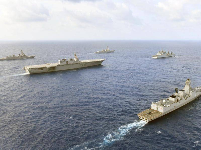 Ships from the US, Japan, India and the Philippines sailing together in the South China Sea