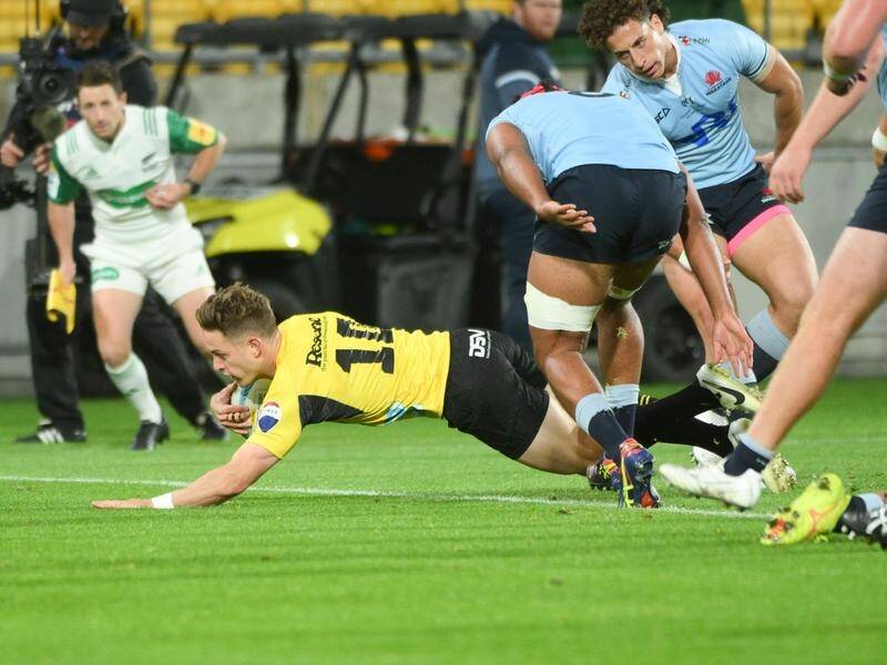 Brett Cameron was among the scorers as the Hurricanes crushed the hapless Waratahs. (Elias Rodriguez/AAP PHOTOS)