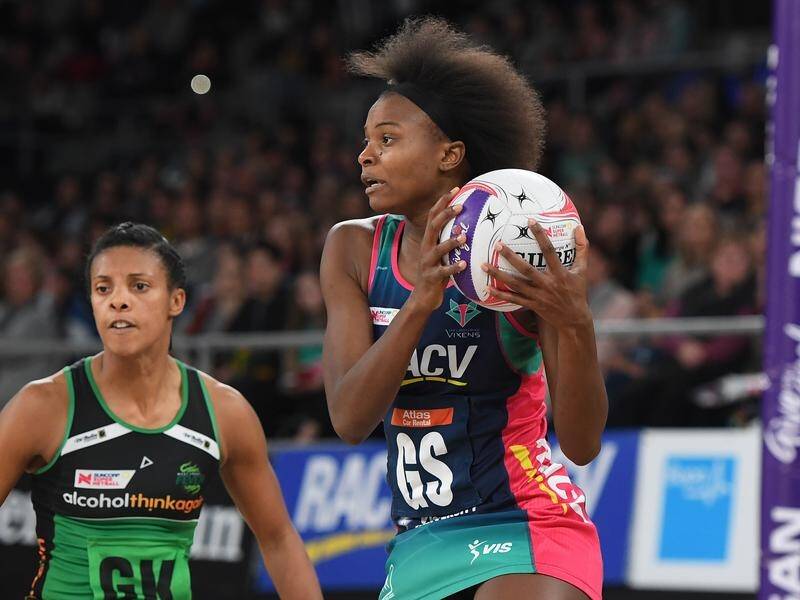 Mwai Kumwenda (right) produced 49 goals for the Vixens in their Super Netball win over the Fever.