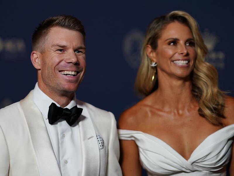 David Warner, pictured with wife Candice Warner, has won the 2020 Allan Border Medal.