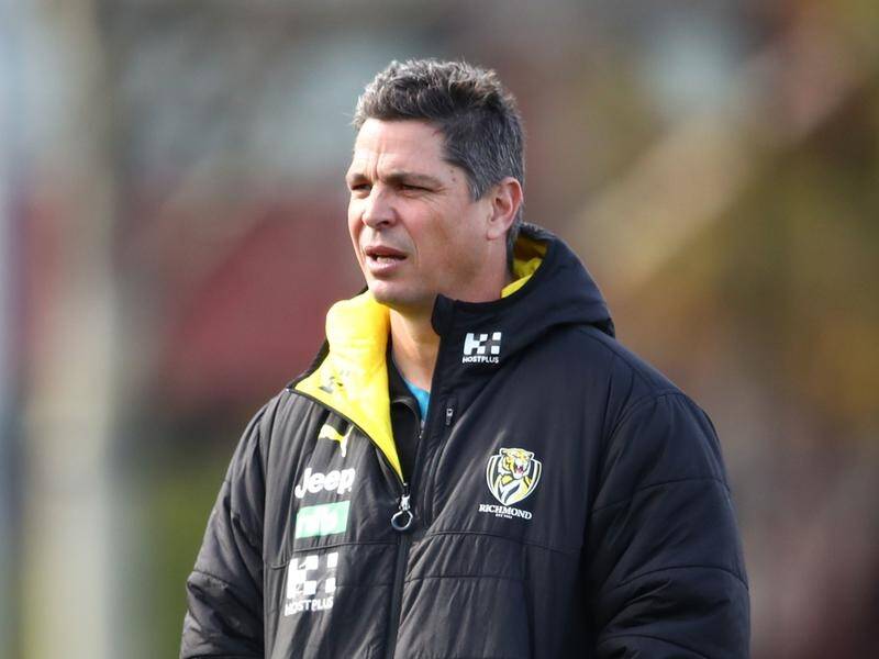 Assistant Adam Kingsley will remain at Richmond in 2022 after missing out on two AFL coaching jobs.