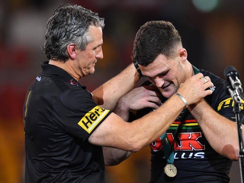 Penrith coach Ivan Cleary presented the Clive Churchill Medal to his son Nathan Cleary.