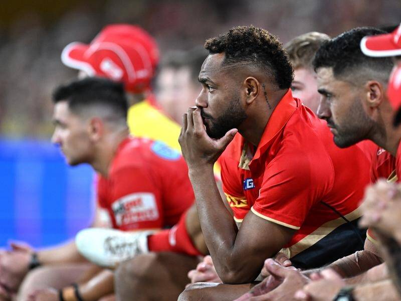 Injured Dolphins No.1 Hamiso Tabuai-Fidow (c) sits on the bench during Friday's loss to Brisbane. (Dave Hunt/AAP PHOTOS)