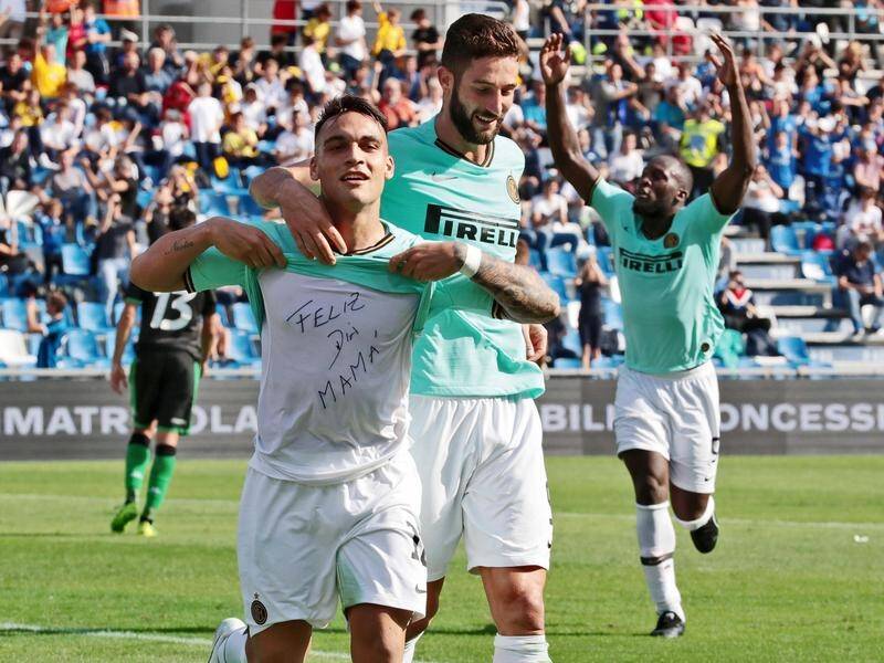 Lautaro Martinez (l) has bagged a brace in Inter Milan's 4-3 win at Sassuolo in Serie A.