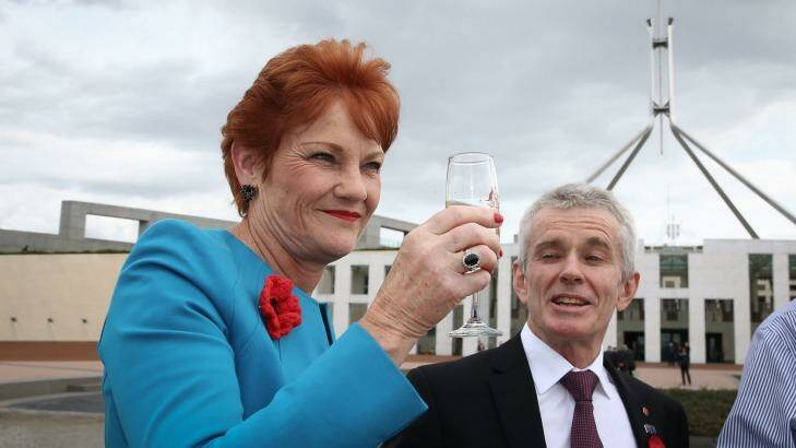 Pauline Hanson and fellow One Nation senator Malcolm Roberts celebrate Donald Trump's success. Photo: Alex Ellinghausen