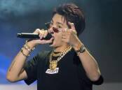 Chinese-born Canadian pop star Kris Wu was sentenced to 13 years in prison for rape. (AP PHOTO)