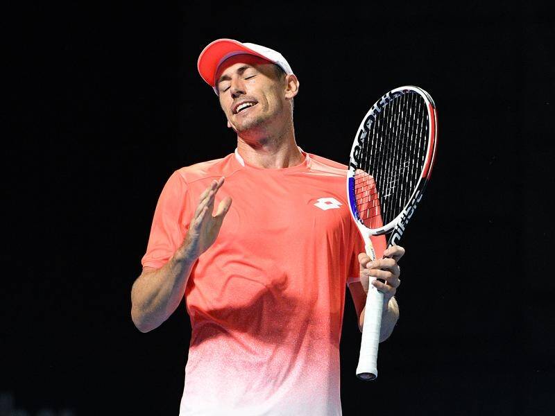 John Millman says the new Australian Open tennis balls do not perform well in cold conditions