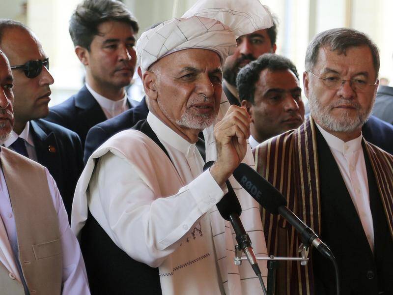 Afghan President Ashraf Ghani is urging the nation to decide its fate without foreign interference.