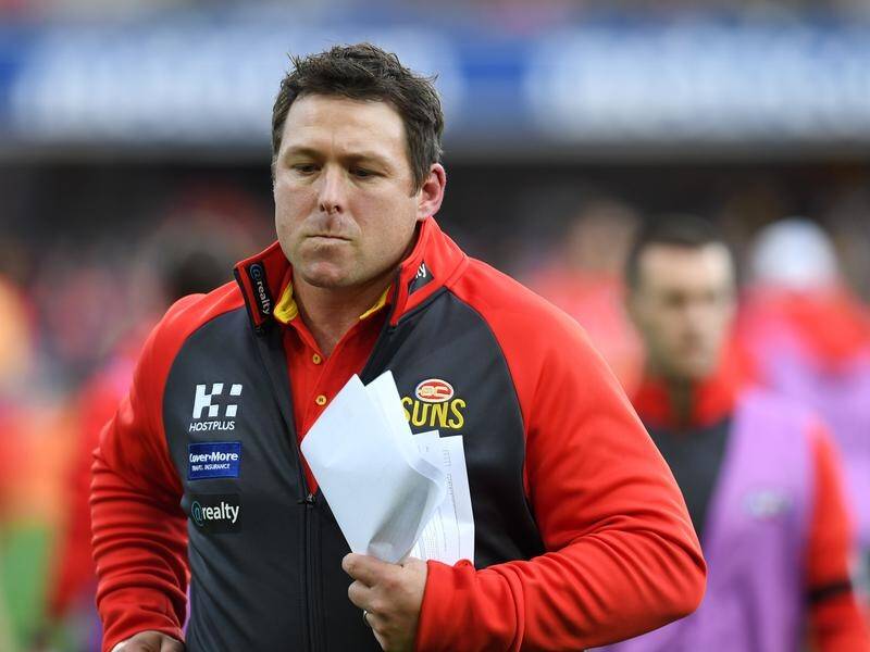 Gold Coast coach Stuart Dew wants to add some AFL experience to his squad.