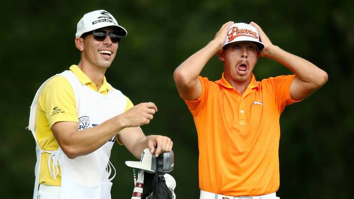 Fowler hunting birdies: Rickie Fowler of the United States reacts on the fifth tee as caddie Joseph Skovron looks on during the final round of the 96th PGA Championship at Valhalla. Photo: Getty Images