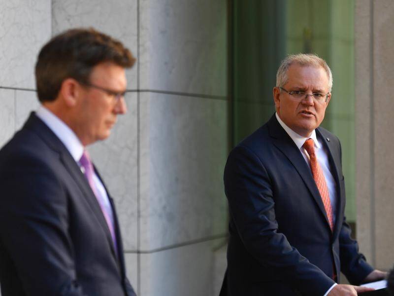 Scott Morrison says a report into education minister Alan Tudge is still being considered.