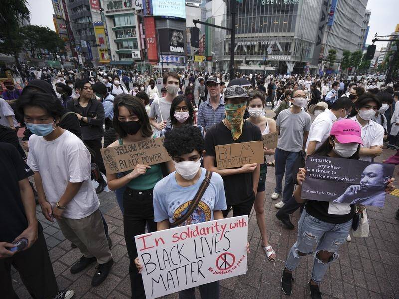 Hundreds of young people have taken to the streets of Tokyo to support Black Lives Matter.