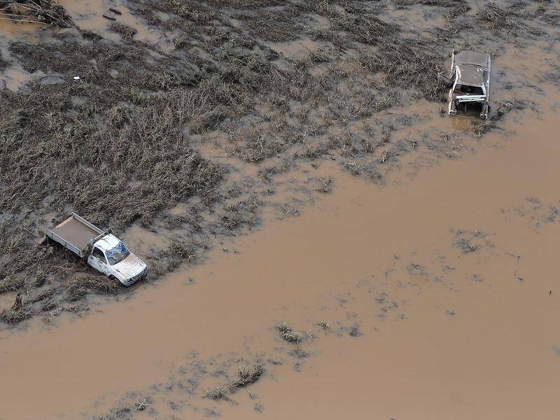 Floods in Grantham, west of Brisbane, led to managed retreat from risk-prone areas in 2013. (Dave Hunt/AAP PHOTOS)
