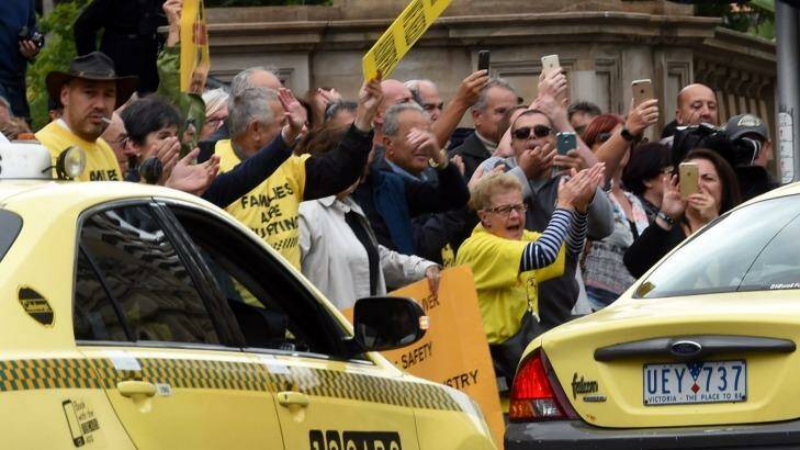 Taxi drivers protesting at Parliament House on Tuesday. Photo: Penny Stephens