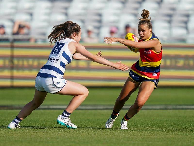 Danielle Ponter (R) has helped Adelaide to a hard-fought 11-point AFLW win over Geelong.