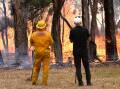 Many residents are being urged to leave as bushfire conditions worsen. (James Ross/AAP PHOTOS)