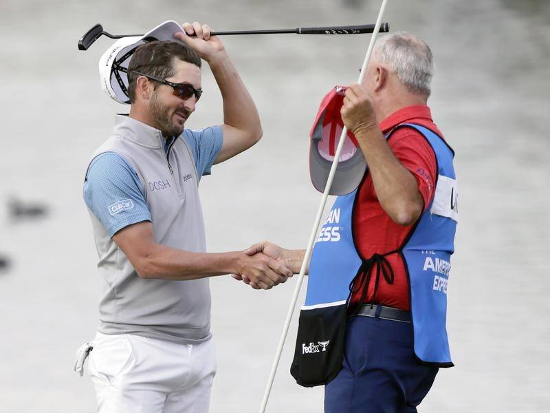 Andrew Landry (L) celebrates with caddie Terry Walker after recovering to win the PGA in California.