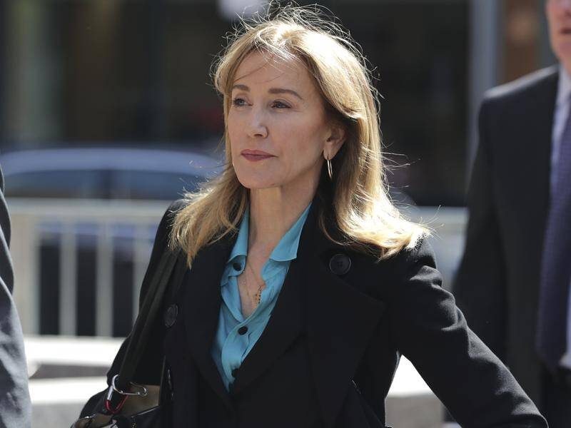 Actress Felicity Huffman is one of 13 wealthy parents charged over a US college bribery scandal.