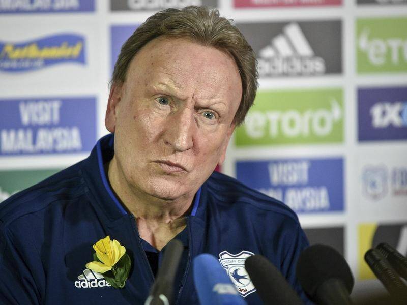 Cardiff City have parted company with manager Neil Warnock.