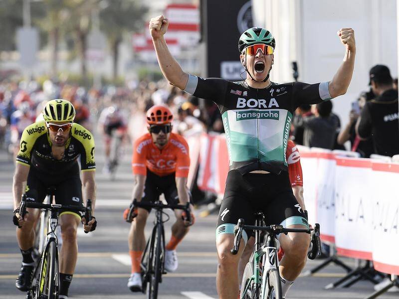 Pascal Ackermann (right) has won the opening stage of the UAE Tour, ahead of Australian Caleb Ewan.