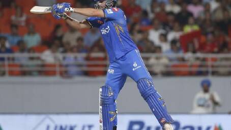 Mumbai Indians' Tim David in action during his useful seven-ball cameo against the Punjab Kings. (AP PHOTO)