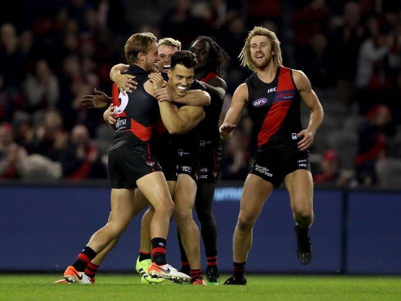 Essendon's Dylan Shiel booted two goals before Fremantle's bold comeback fell short in Melbourne.