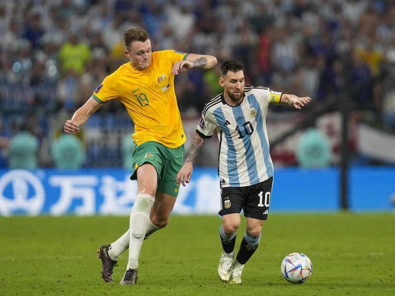 Harry Souttar, here chasing Lionel Messi, has joined Leicester amid a boost from the club owners. (AP PHOTO)
