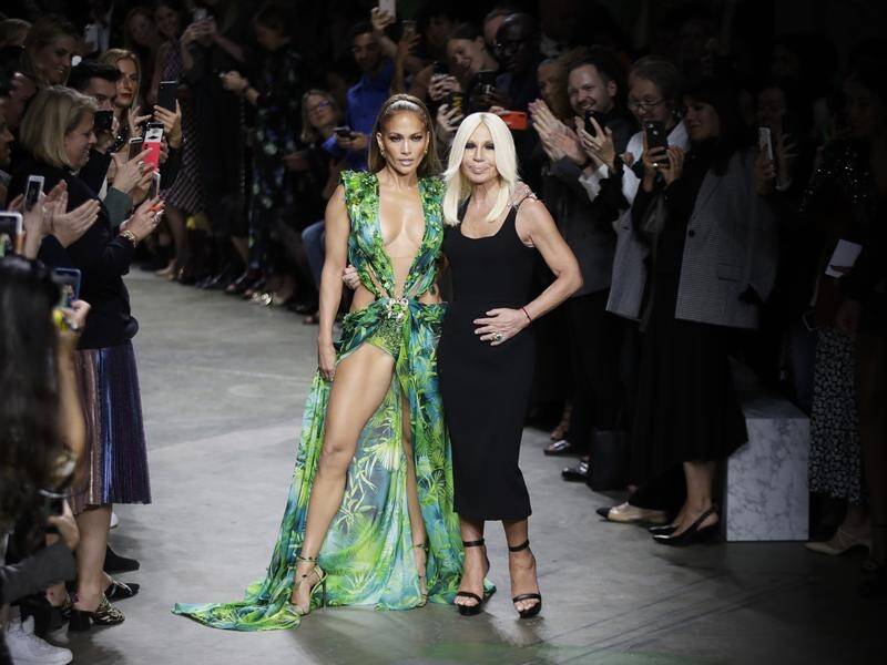 Jennifer Lopez revealed a new version of the Donatella Versace "jungle" dress she wore 20 years ago.