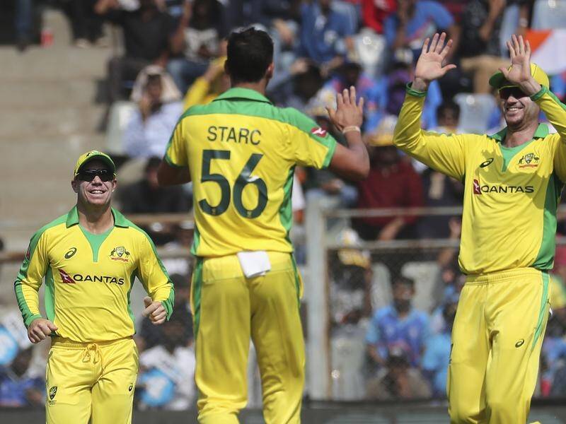 Mitchell Starc took 3-56 as India were bowled out for 255 in Australia's 10-wicket win.