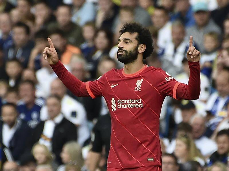Liverpool's Mohamed Salah celebrates his 100th Premier League goal in the win over Leeds.