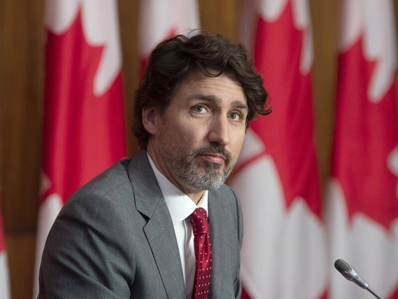 Justin Trudeau says Canada aims to almost halve its emissions from 2005 levels by 2030.