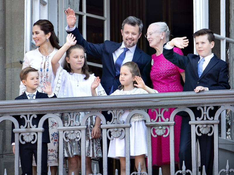 Danish Crown Prince Frederik has waved to well-wishers on his 50th birthday, with wife Mary.