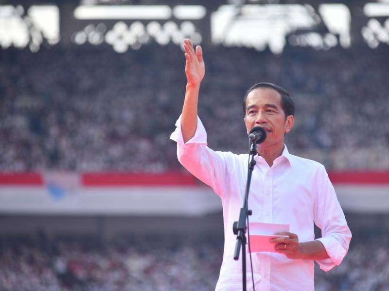 Indonesian incumbent presidential candidate Joko Widodo at a rally in Jakarta's main stadium.