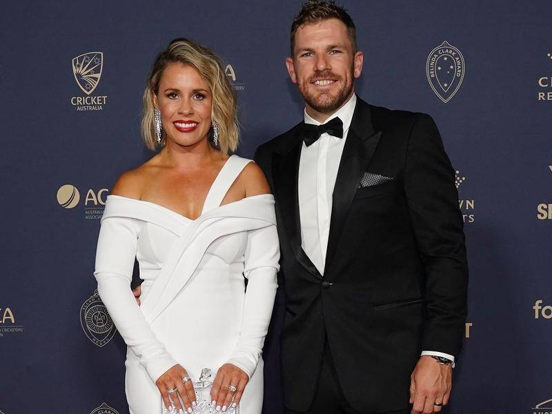 Aaron Finch, pictured with Amy Finch, has won Australian cricket's ODI player of the year.