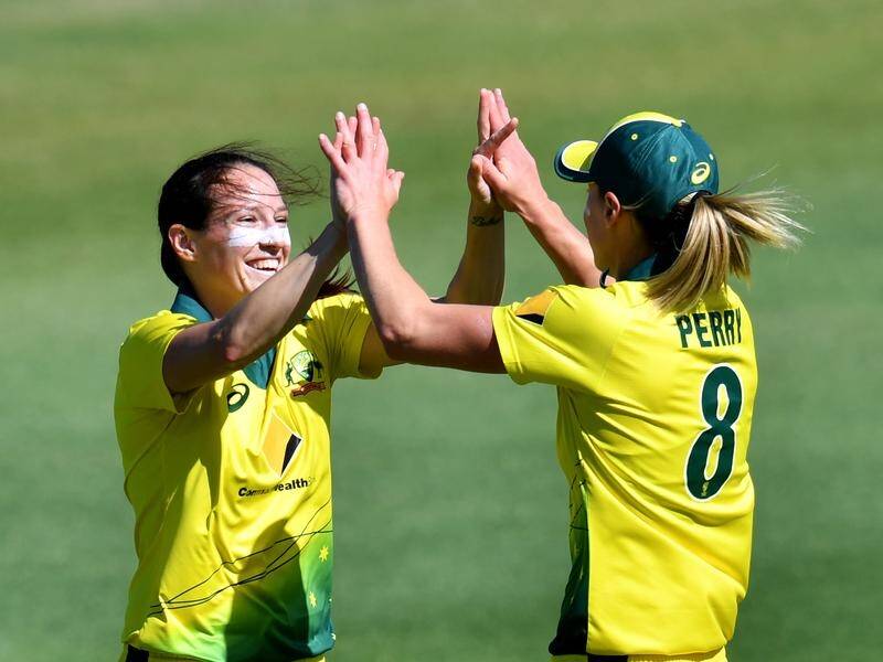 Megan Schutt (left) says expect a more aggressive approach from Australia at the World T20.
