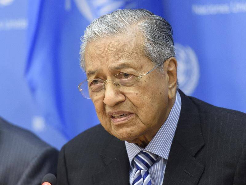 Mahathir Mohamad says Malaysia will study the impact of the boycott called by Indian traders.