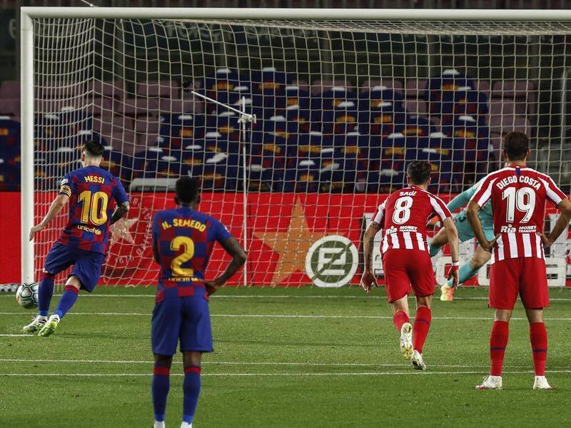 Barcelona's Lionel Messi has slotted home a penalty for his 700th career goals for club and country.