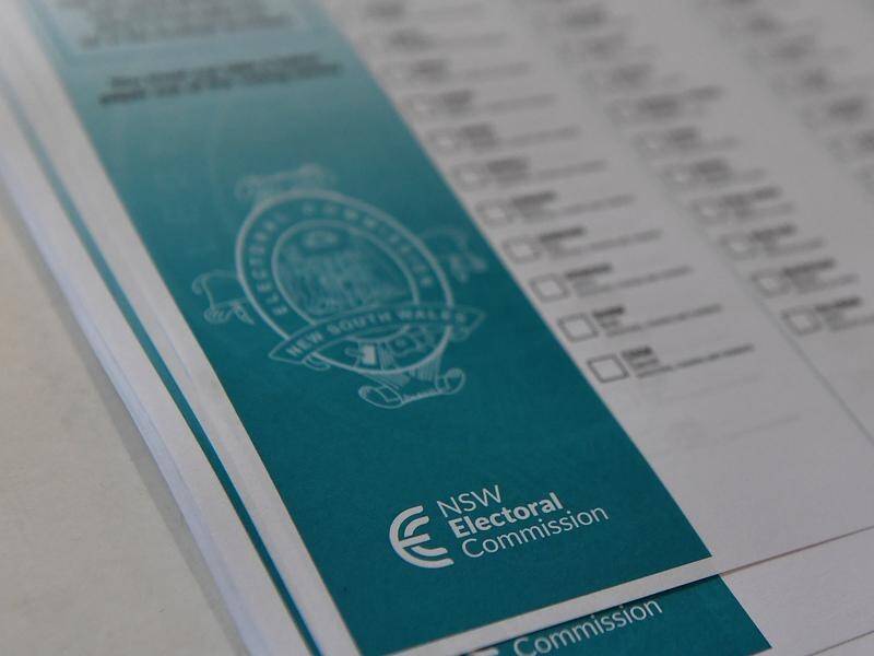 An unauthorised person has handed out ballot papers in one Sydney electorate.