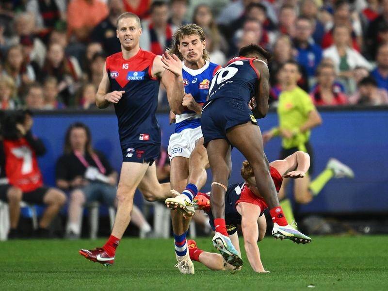 Demons stars are being advised to lose the bump, like this one by Kysaiah Pickett, from their game. (Joel Carrett/AAP PHOTOS)